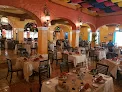 Restaurante Hacienda El Mortero Blvd. Kukulcan 9 Restaurante Hacienda El Mortero captivates visitors with top-notch atmosphere, food, music, and service.