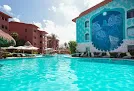 Selina Cancun Laguna Hotel Zone & Cowork Selina Cancun Laguna Hotel Zone & Cowork is a trendy 2-star hostel with dining options, a pool, free parking, Wi-Fi, and beach access.